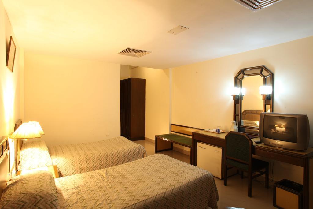 Hotel Jammu Ashok Стая снимка